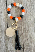 Load image into Gallery viewer, Orange Black and White Wristlet
